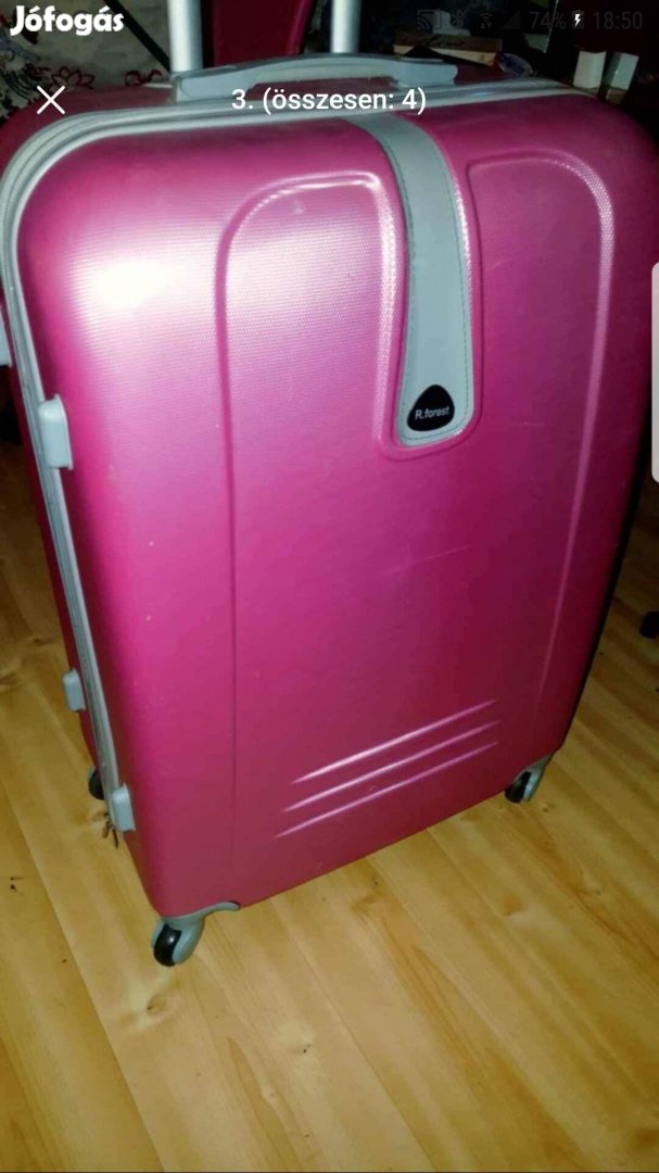 Rózsaszínű bőrönd