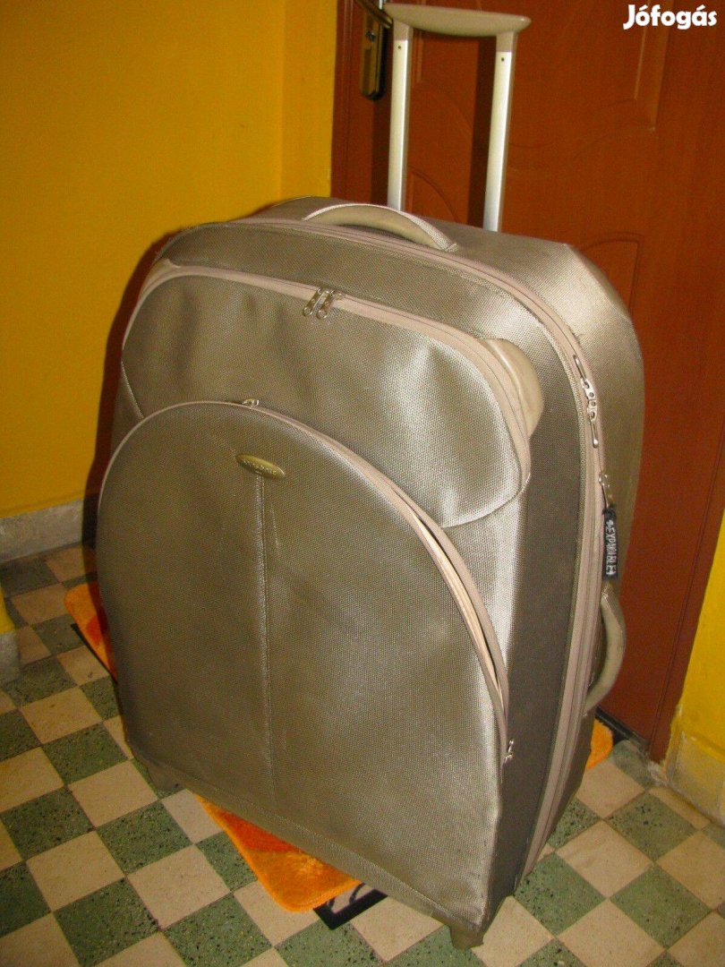 Samsonite gurulós bőrönd 3XL 85x32x32-37, arany vászon 4 görgős