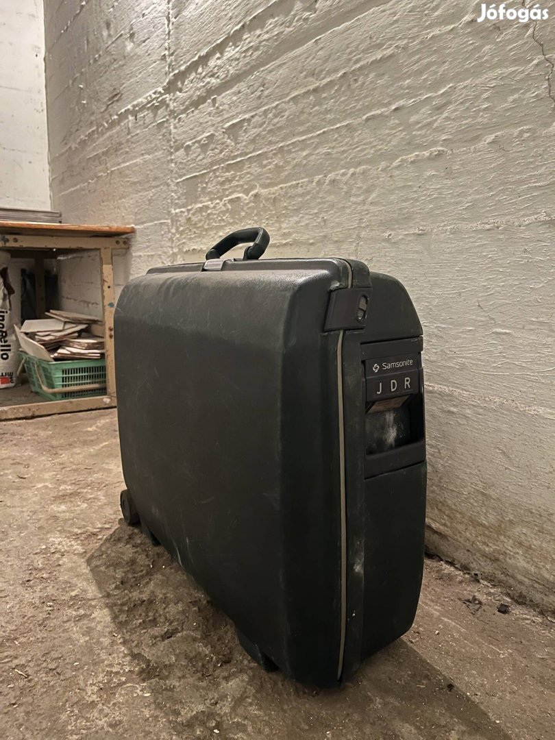 Samsonite keményfedelű bőrönd - használt, jó állapotú