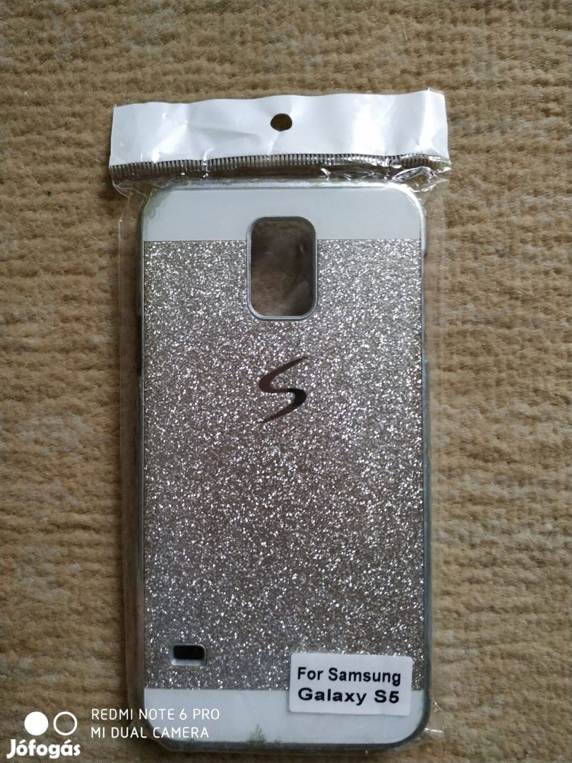 Samsung Galaxy S5 ezüst színű telefontok mobildísszel új