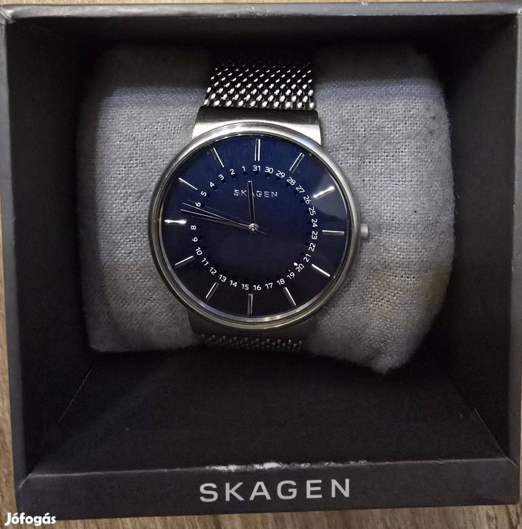 Skagen férfi karóra, kék dátummutatós számlap, ezüst fém keret és szíj