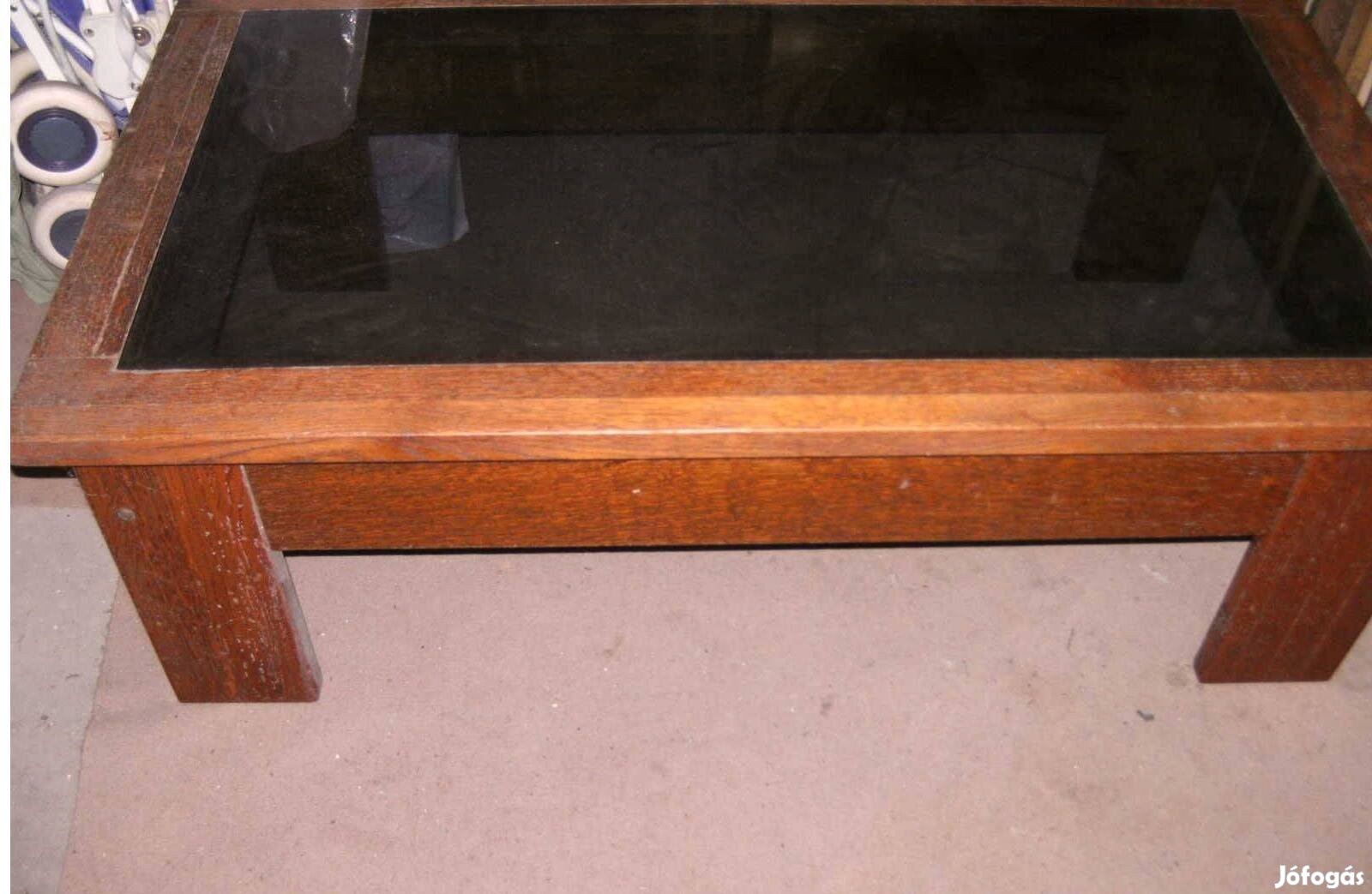 Sötétített üvegű, sötétbarna, erős fa dohányzóasztal kb.70*120*40cm