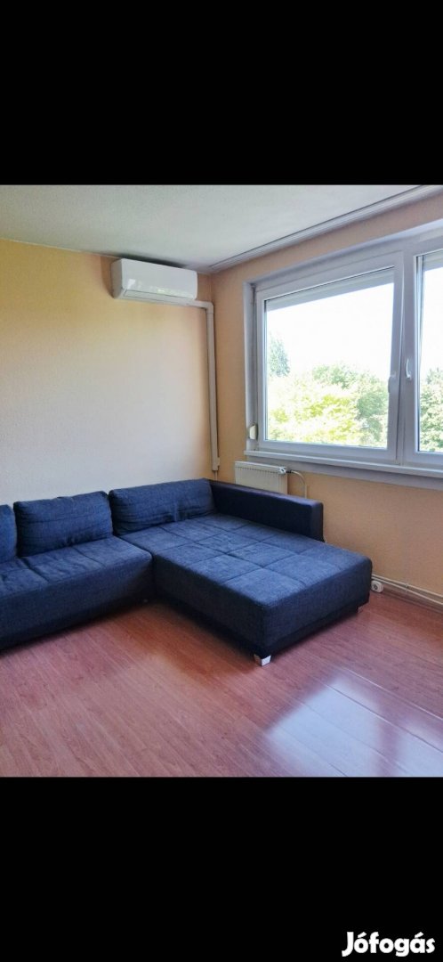 Sötétszürke sarokkanapé ágyneműtartóval - azonnal elvihető