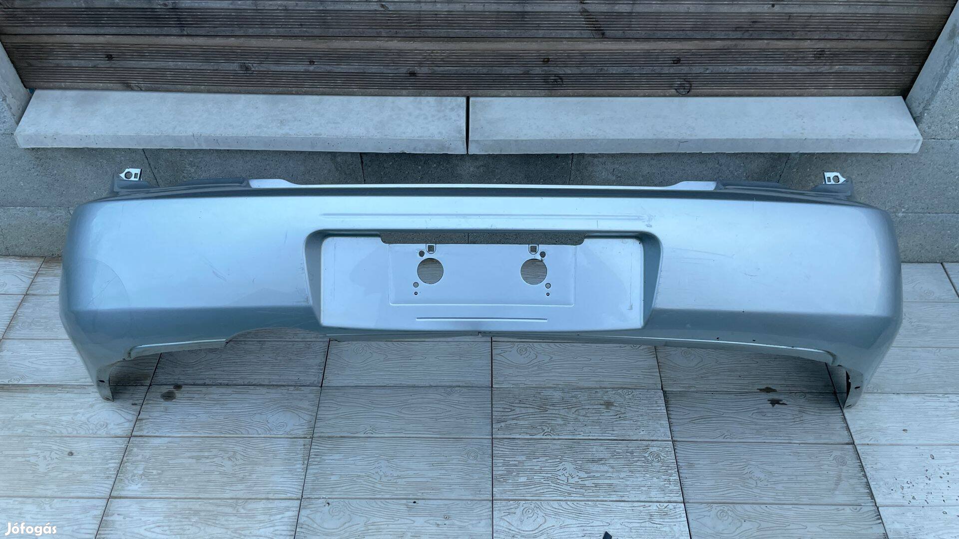 Subaru Impreza kombi hátsó lökhárító 57704FE140