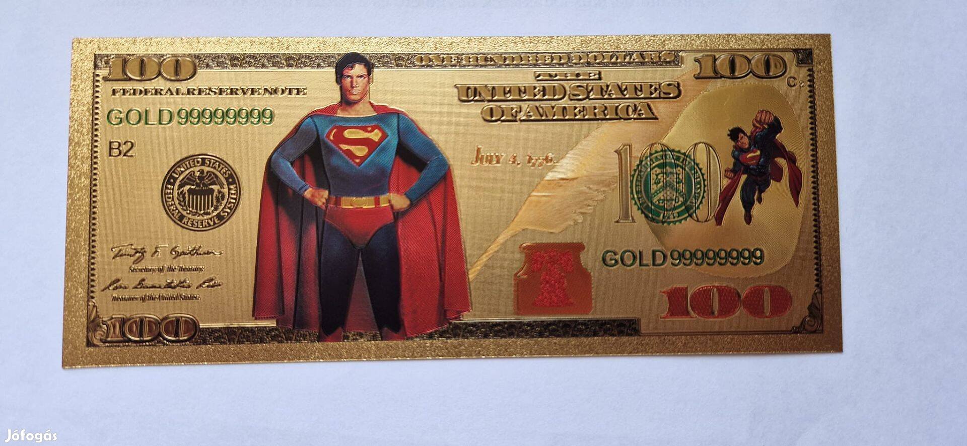 Superman - színes, aranyozott, plasztik, fantázia 100 dollár