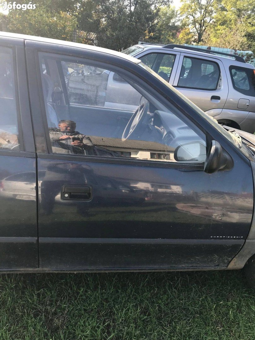 Suzuki Swift jobb első ajtó eladó sötétkék színben