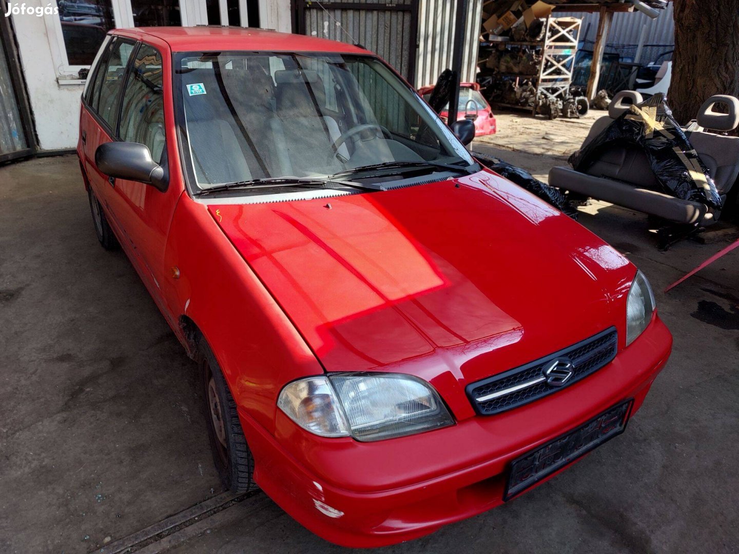 Suzuki Swift karosszéria elemei piros 2002-év