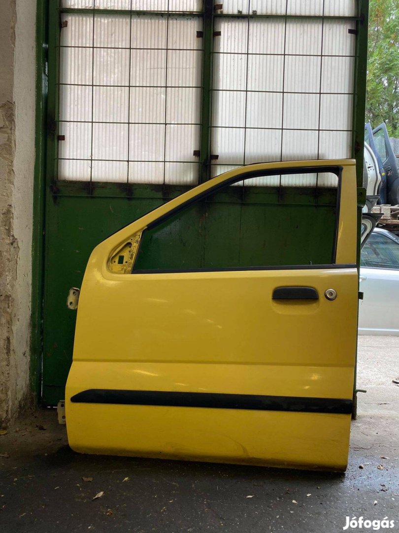 Suzuki ignis bal első sárga ajtó
