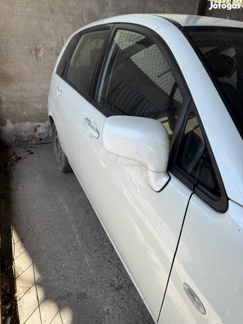 Suzuki liana jobb első fehér ajtó