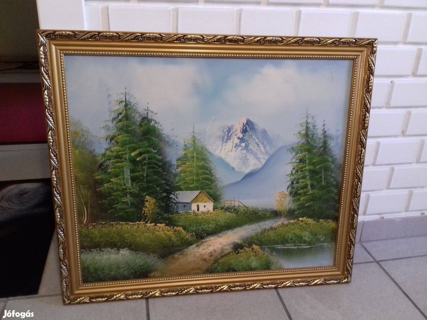 Tájkép festmény havasok fenyő erdő kis házzal