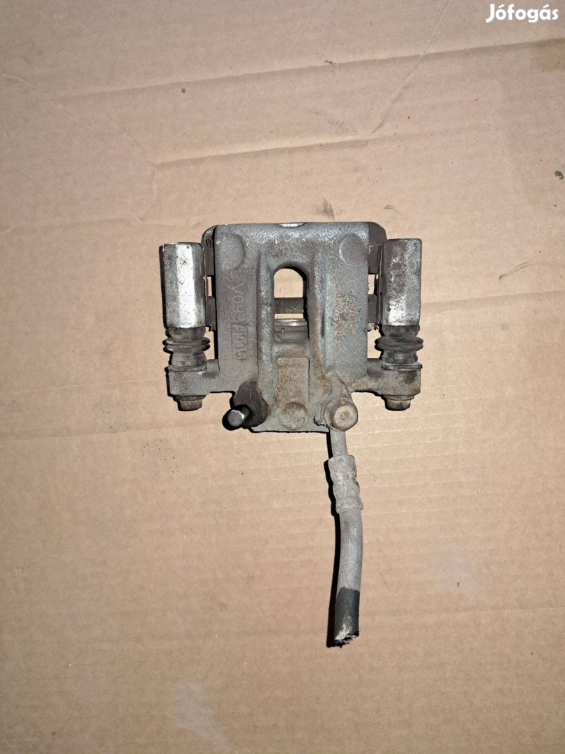 Toyota Corolla E12T Bal hátsó féknyereg, kengyellel Újszerü
