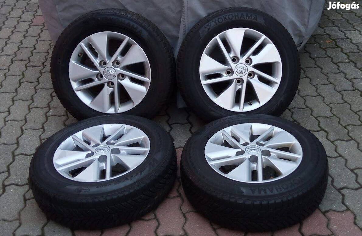 Toyota felni 15 Auris 15" gyári alufelni téli gumikkal eredeti anyák