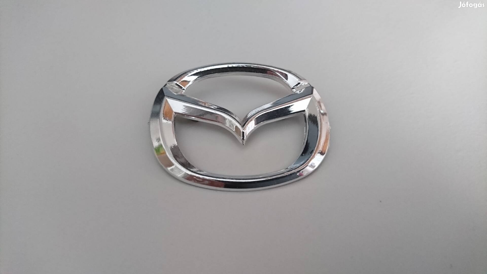 Új Mazda 55x45 embléma eladó! 