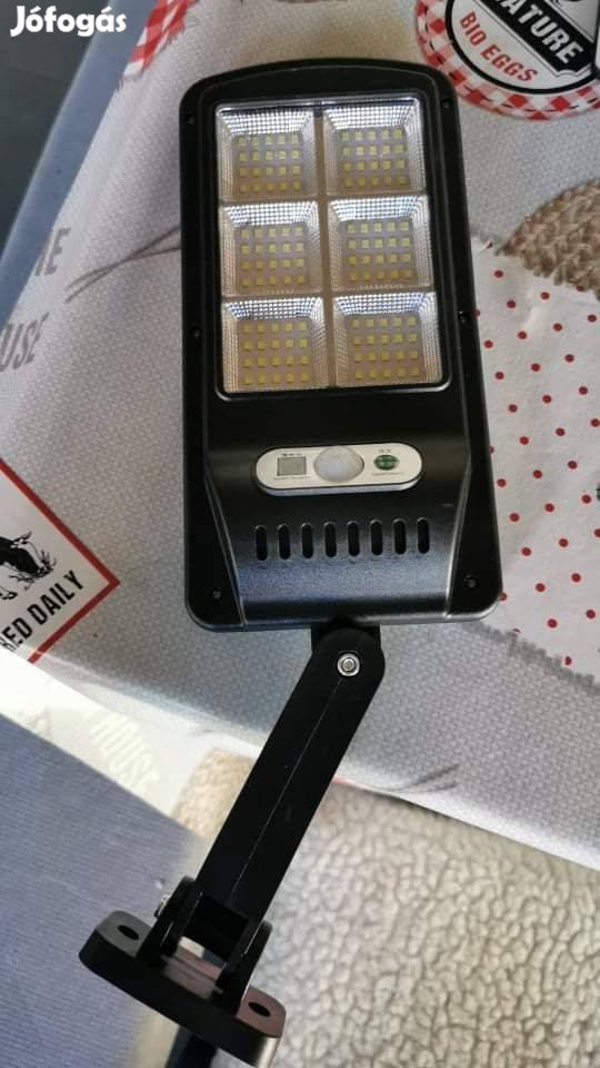 Új Napelemes LED kültéri mozgásérzékelős fali lámpa távirányítóval