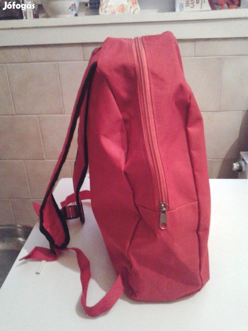 Új, nem használt hátizsák piros-sárga színnel nem bélelt