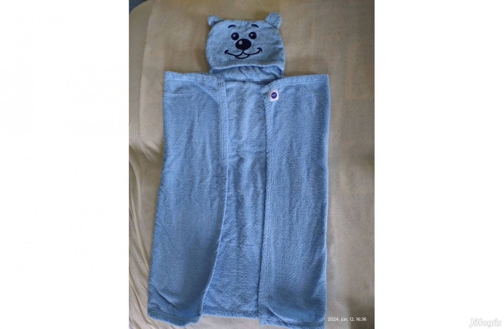Újszerű nagy baba kifogó törölköző eladó