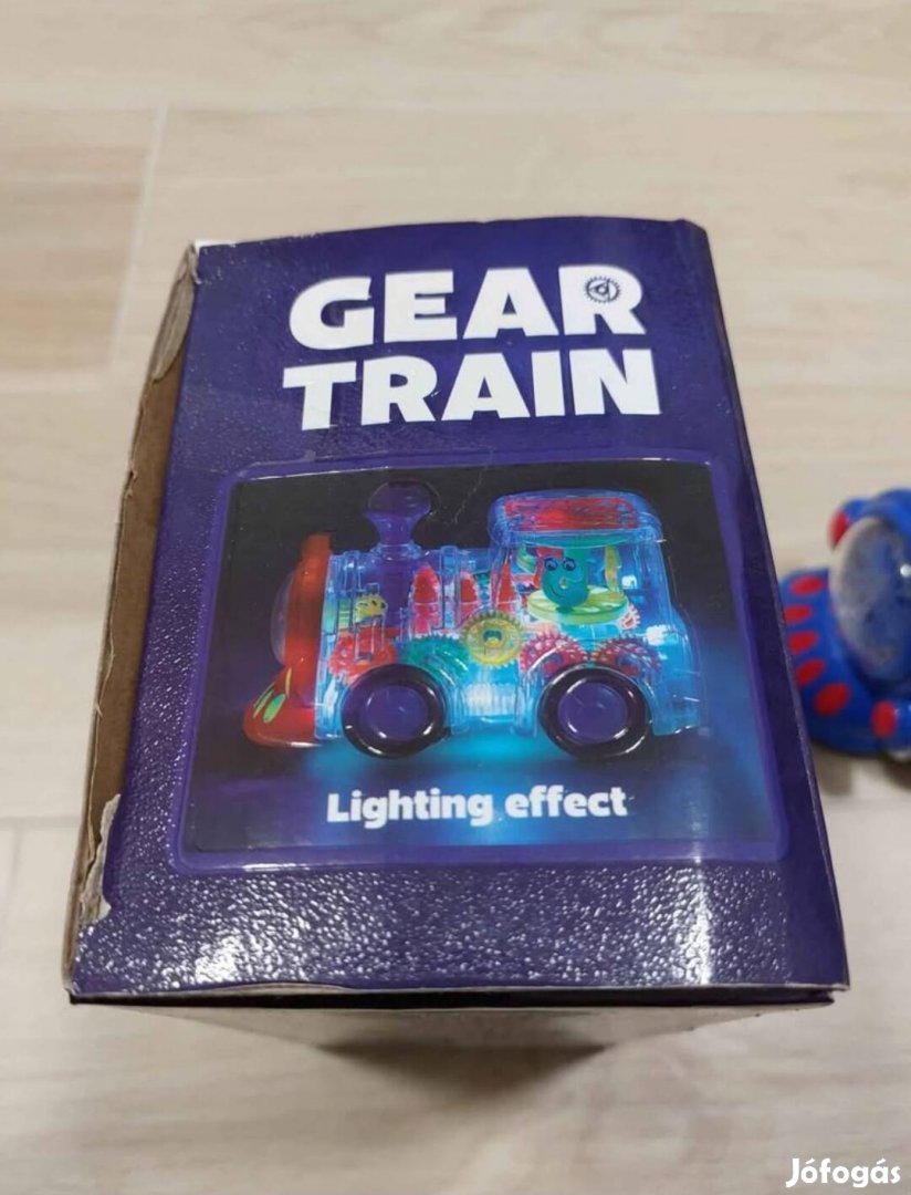 Világító, zenélő játék mozdony