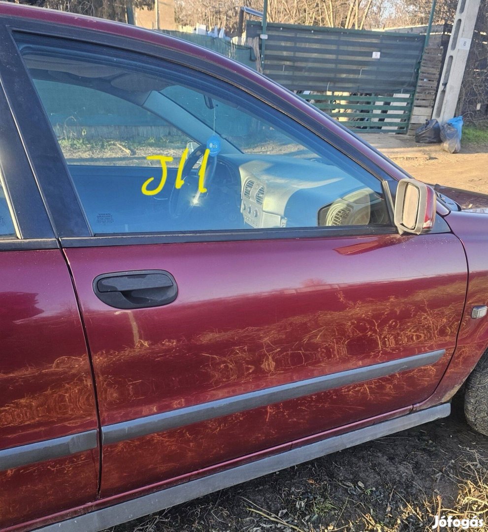 Volvo s40 bordó ajtó 10000