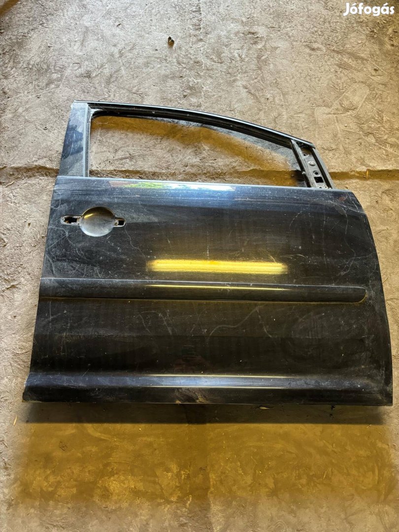 Vw Caddy jobb első ajtó fekete