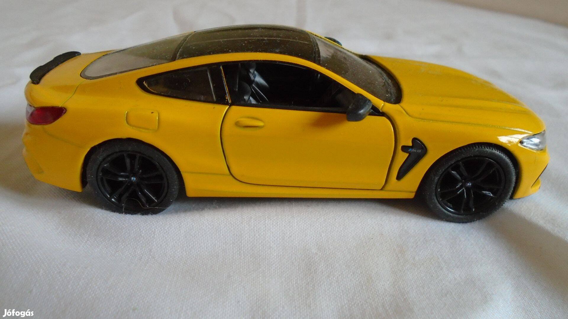 "Kinsmart" BMW M8 Coupé - sárga, fém, nyitható ajtós - újszerű