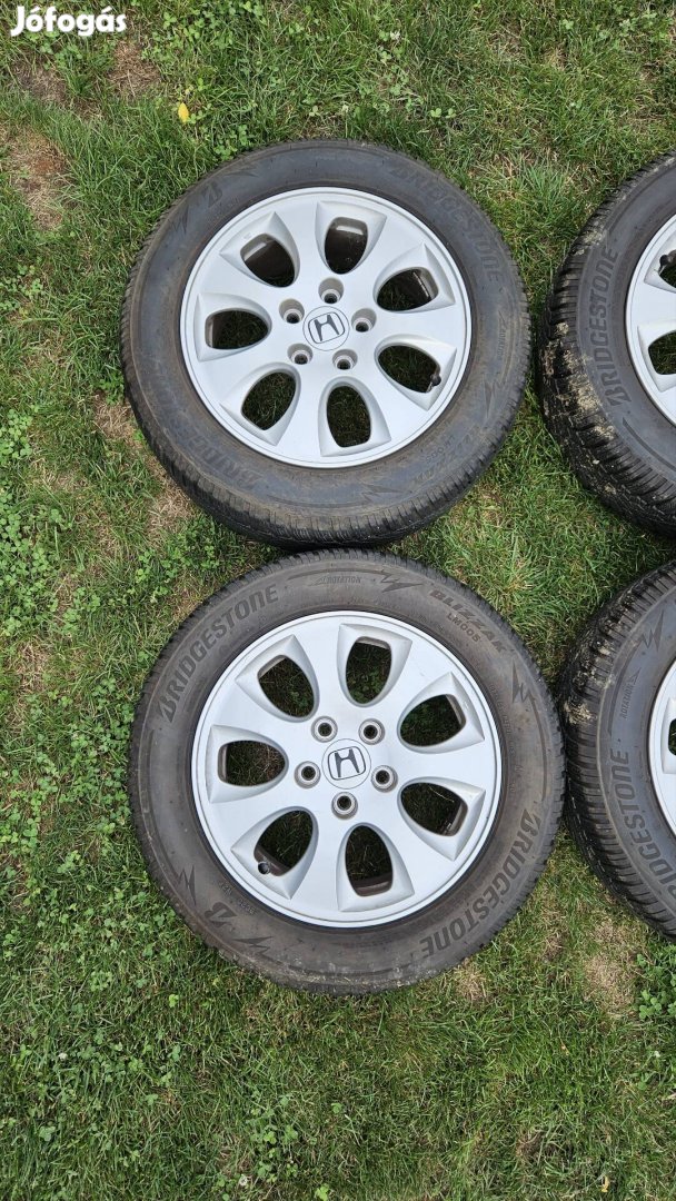 honda gyári 16os alufelni téligumival