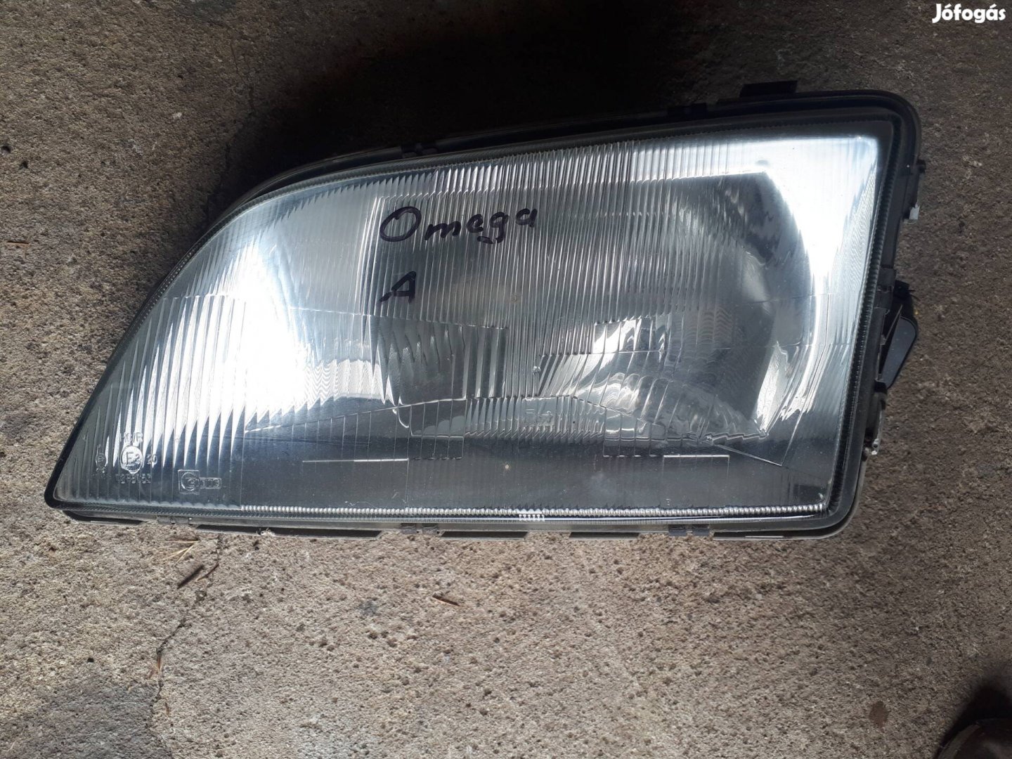 opel omega  ,A, bal első motoros  lámpa Cibie 90376287
