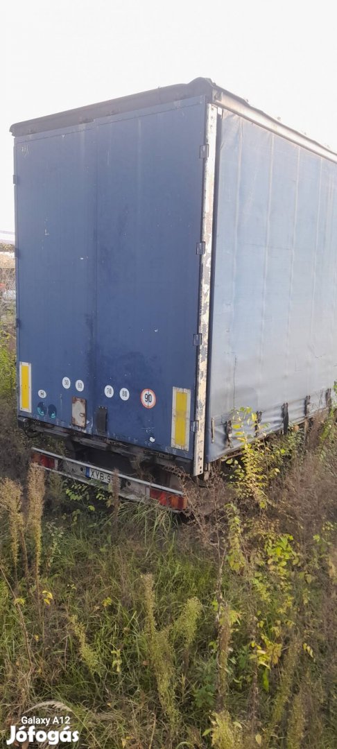 pótkocsi ponyva vasakkal