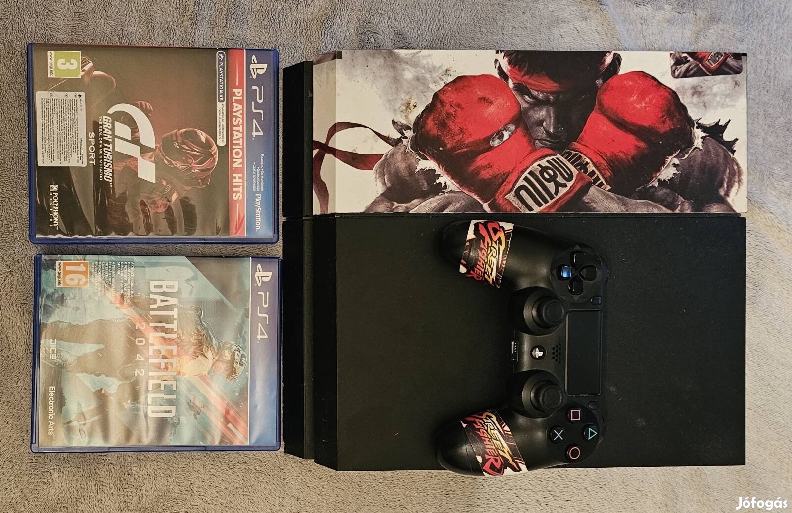 ps4 fat 500 GB 2 db játékkal+ ajándék kamera és kontroller tartó