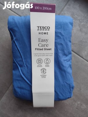 100x200 cm-es kék gumis lepedő (Tesco: 52% poliészter, 48% pamut)