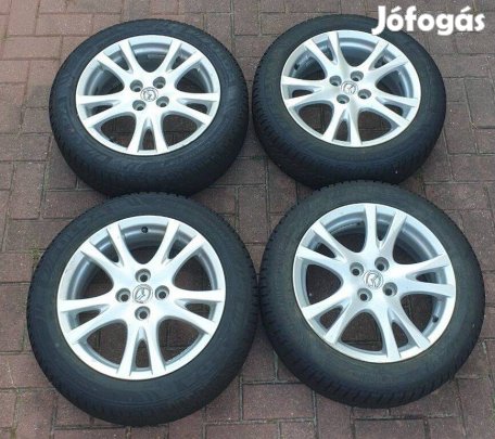 4db , 16os , 4x100 Mazda gyári alufelni eladó , téli gumival együtt