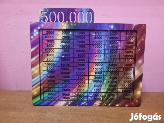 500.000 ft-os persely szivárványos háttérrel