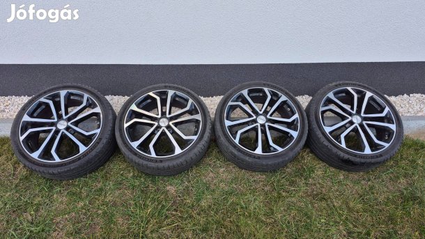 5x114,3 Dezent TA dark 7x18 ET40 alufelni Michelin 215/40R18 Renault