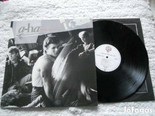 A-HA : Hunting high and low LP ( NM/EX)