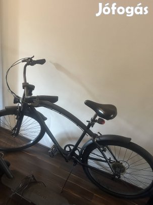 A képen látható kerékpár olcsón eladó