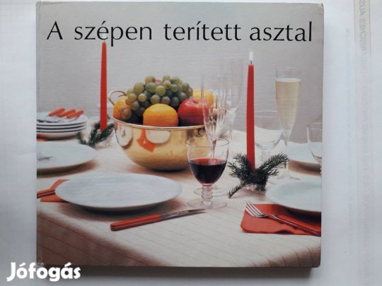 A szépen terített asztal, könyv