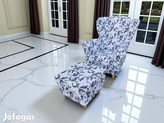Agy méretű füles fotel virág/inda motívummal, lábtartó zsámollyal