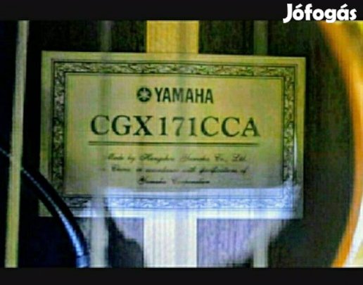 All solid wood thin bodied nylon string guitar 