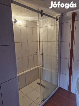 Állitható széleségű tusoló ajtó 