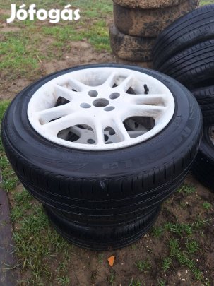 Alufenik 4x100 osztoköre jo álapotuak jo nyári gumikal 15 sek