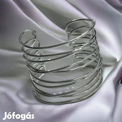 Ariel ezüst színű merev bizsu karkötő