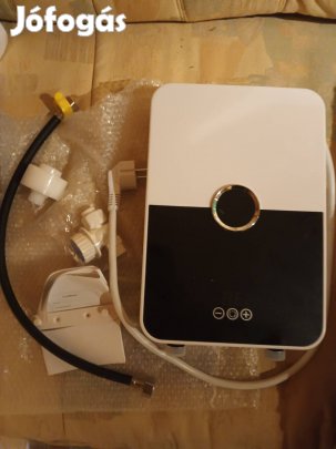 Átfolyós vízmelegítő dobozában eladó.