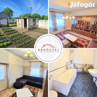 Baján, Katonavárosban házrész eladó saját telekkel!