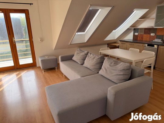 Baján, alvégen, 56nm-es lakás, teremgarázsban parkolóval, saját tároló