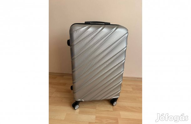 Bőrönd keményborítású , új (77 x 47 x 30 cm )