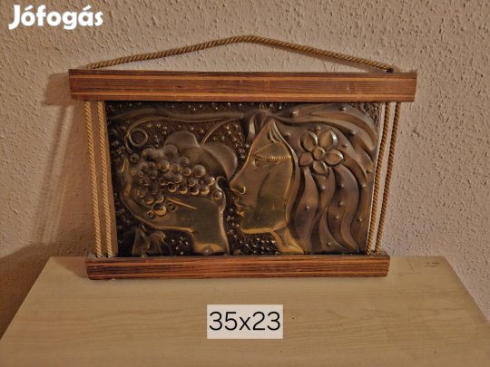 Bronz színű fali dísz 35×23