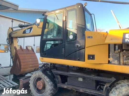 Caterpillar M318D gumikerekes kotró, bontásra-alkatrésznek