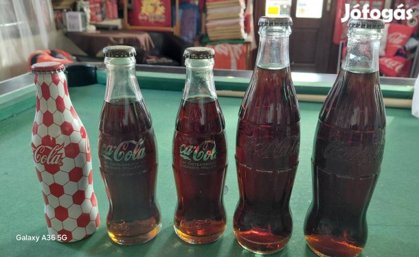Coca Cola teli palackok