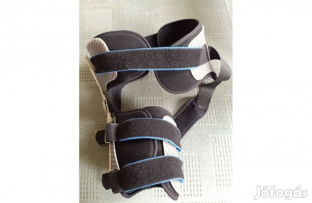 Csípő- és combtőrögzítő hajlásszögbeállítóval