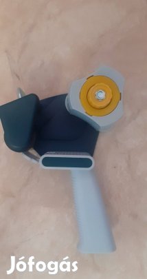 Csomagzáró ragasztó szalag adagoló