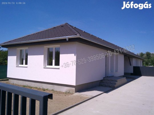 Dánszentmiklóson újépítésű ingatlan garázzsal   eladó